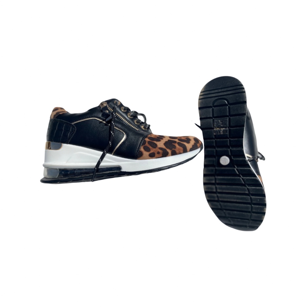 Cute fashion sneakers ! Leopard and black great condition never worn outside .